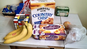 My first grocery store swag: nectarines, fruit yogurt, granola cereal, bananas, and a box of Mondrian tissues.